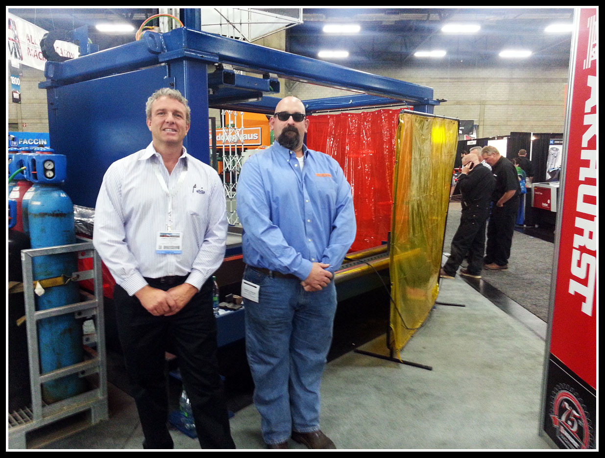 Darryl Thornhill and Jeremy in front of the Ocean Liberator, the worlds fastest selling CNC Beam Coping Machine